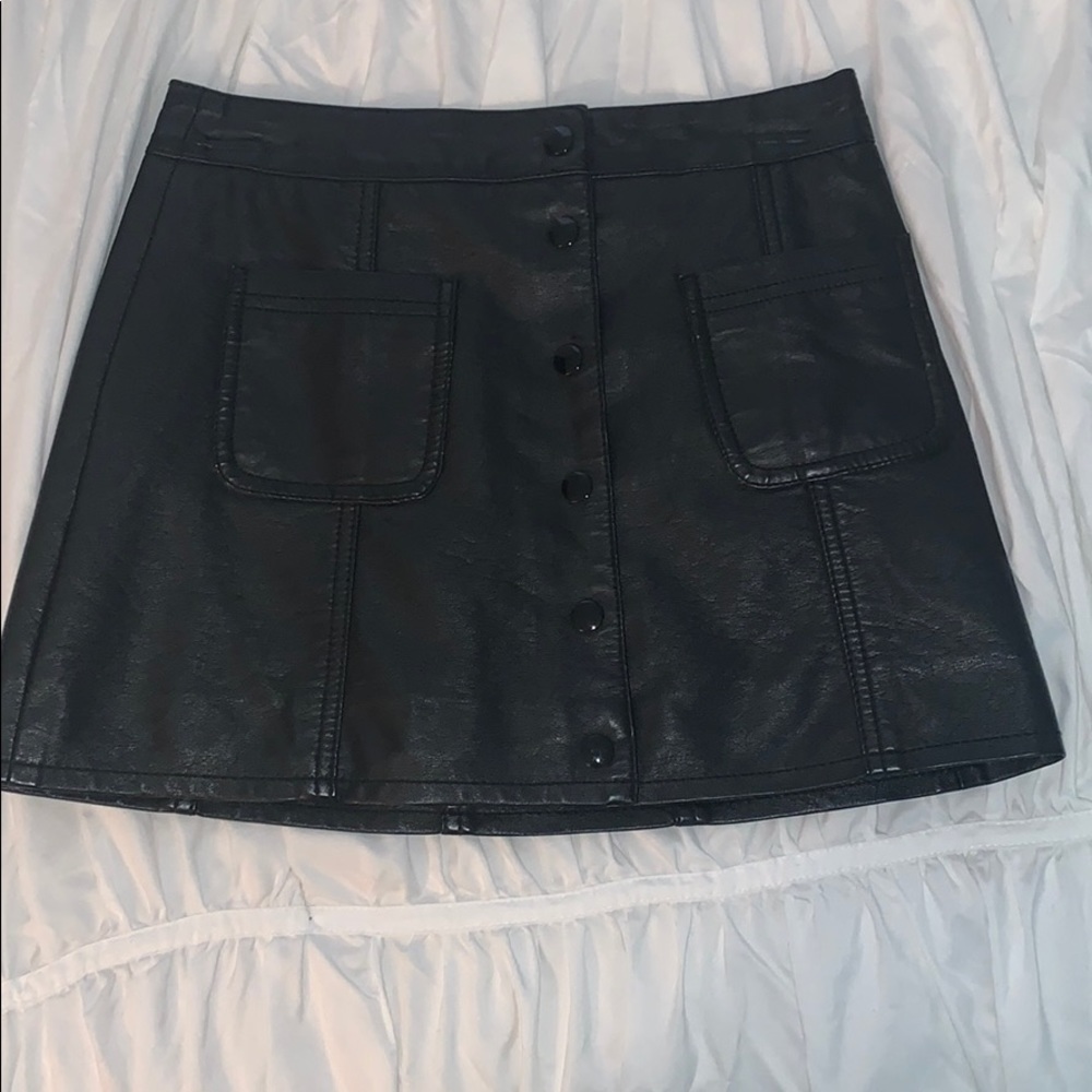 buttoned black leather skirt